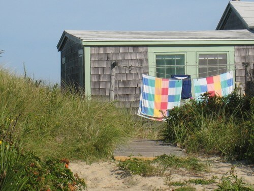 Beach towels flap from clotheline